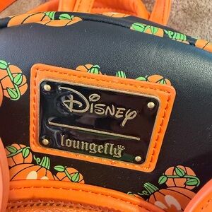 Disney Loungefly Black and Orange Backpack